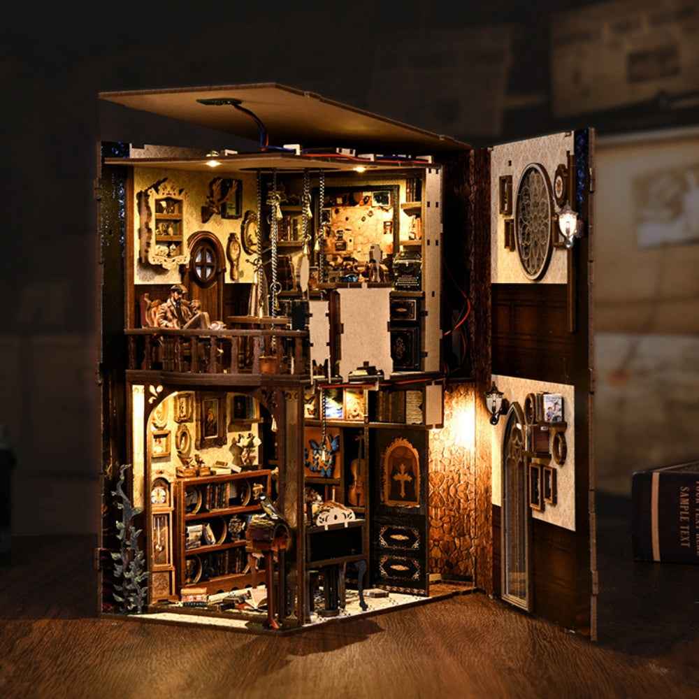 Dark Box Mystery Case with its roof and side panels open, exposing two miniature rooms.