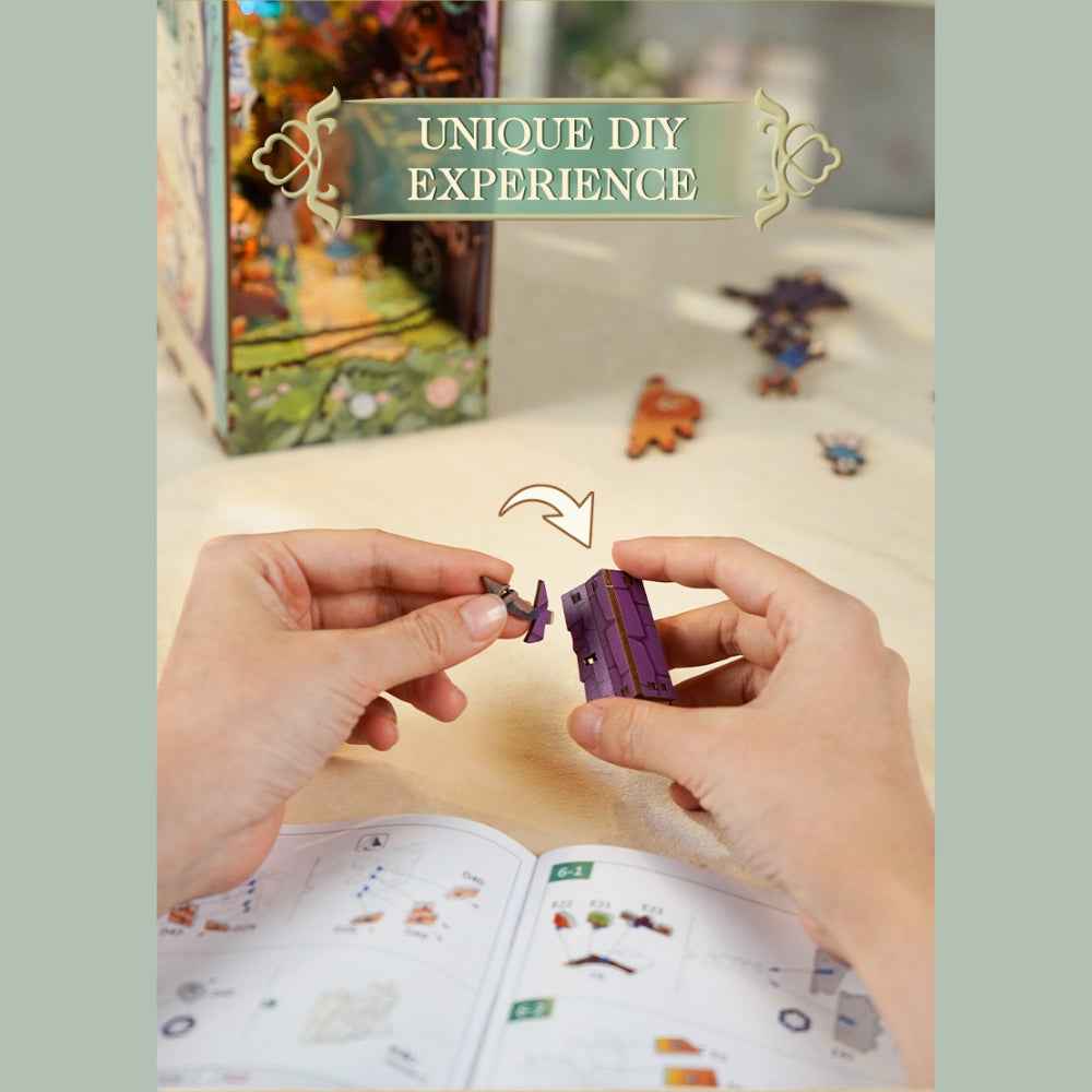 Hands assembling a small purple component for Dorothy's Journey.