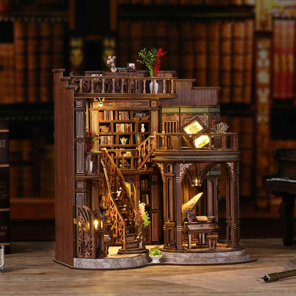 Dreamy Book Hall miniature library with tall shelves, stairs and a round projecting reading room.