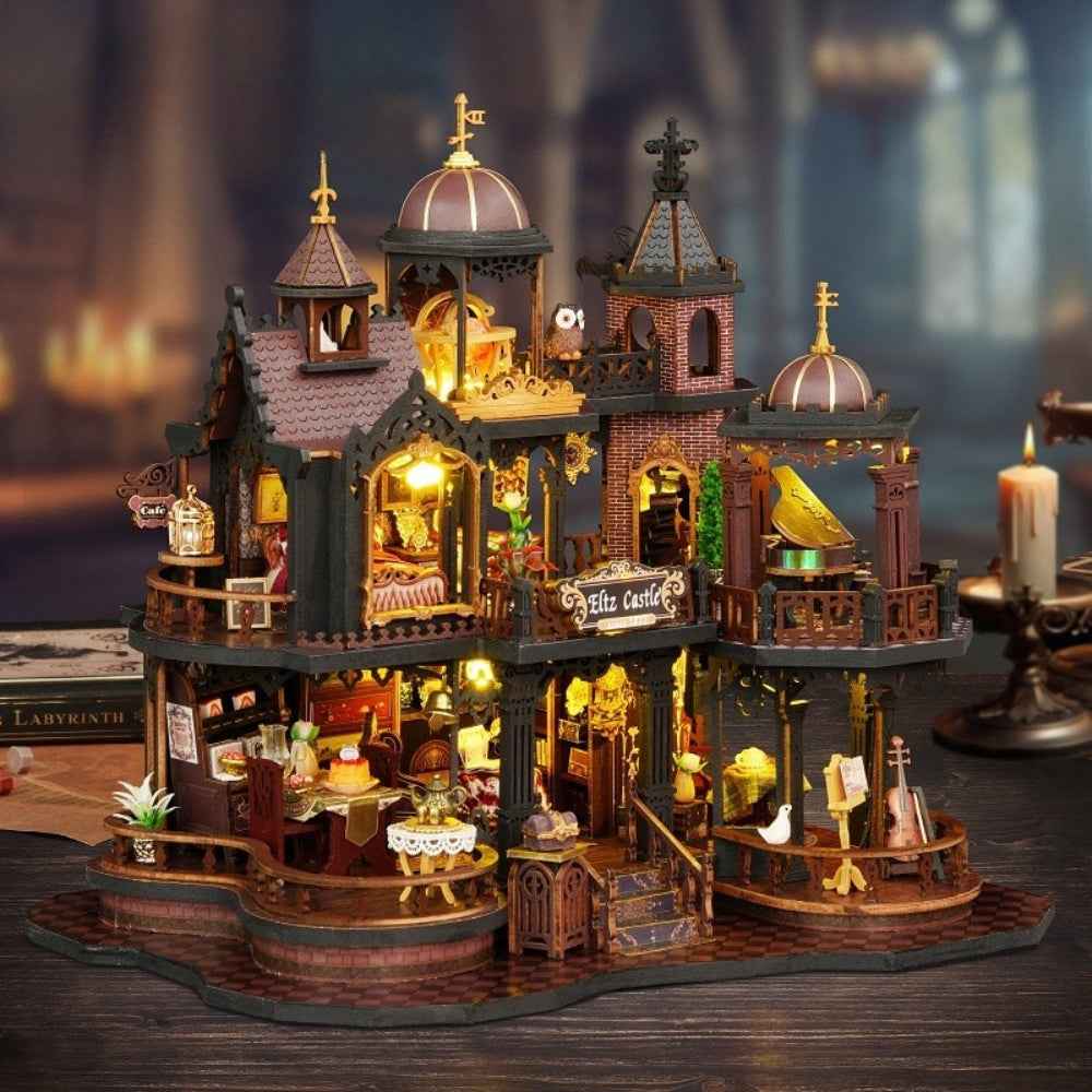 Edinburgh Castle miniature house with domed towers, balconies and warmly lit open rooms.
