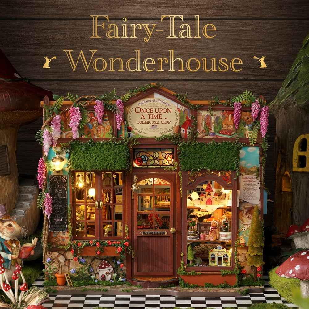 Fairy-Tale Wonderhouse front view with trailing flowers, green foliage and a central wooden door.