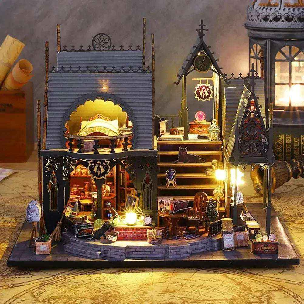 Luna Magic House with a pointed roof and glowing miniature rooms, viewed from the front.