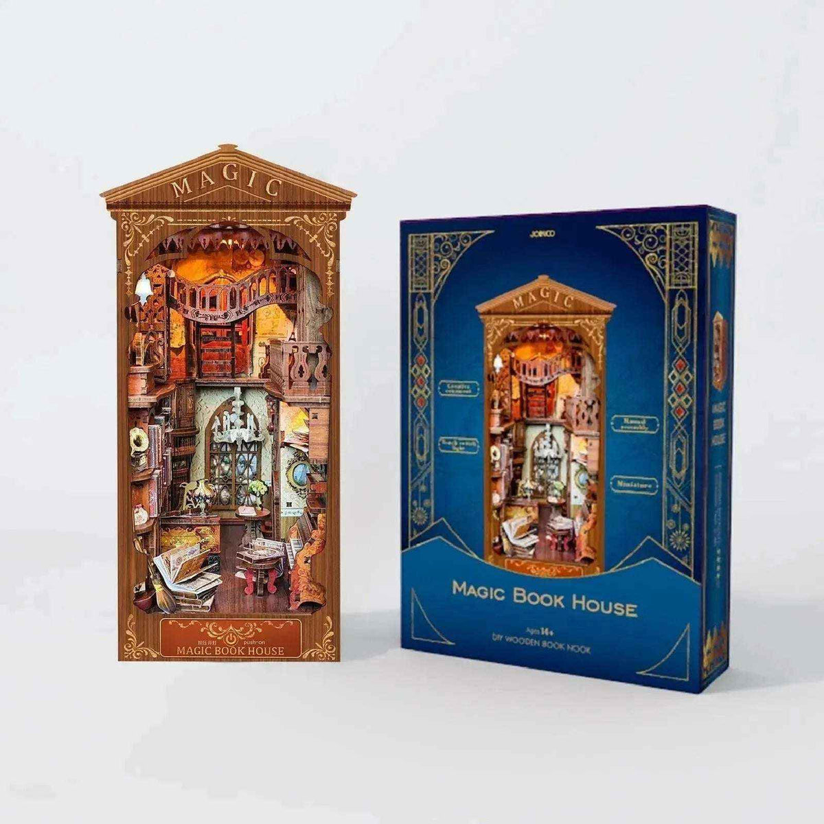 Completed Magic Book House book nook beside its blue illustrated packaging.