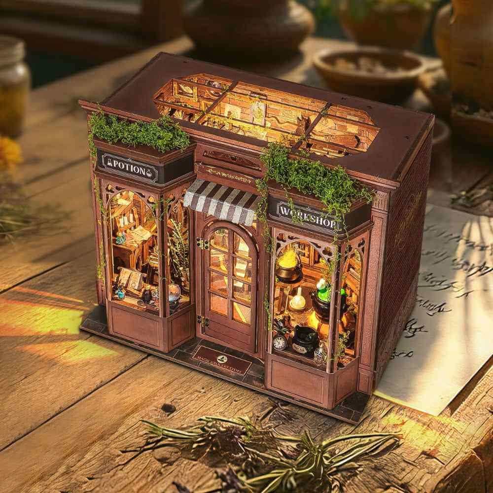 Overhead angle of Magic Potion Workshop showing its decorated roof and illuminated shop windows.