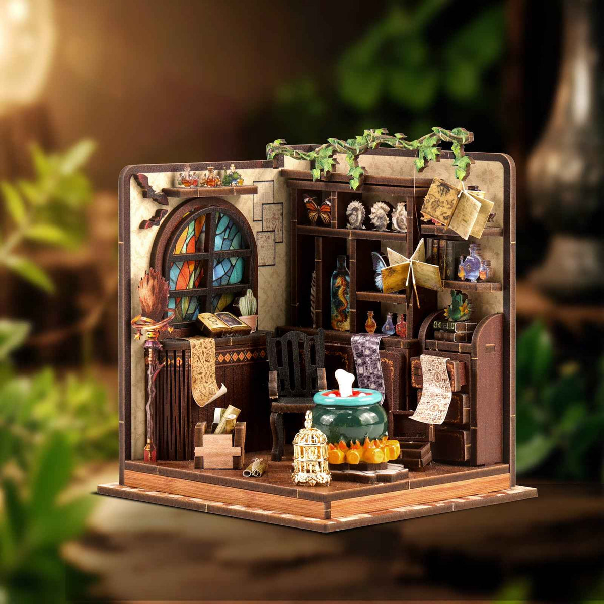 Magic Potion Workshop miniature room with a stained-glass-style window, shelves and a green cauldron.
