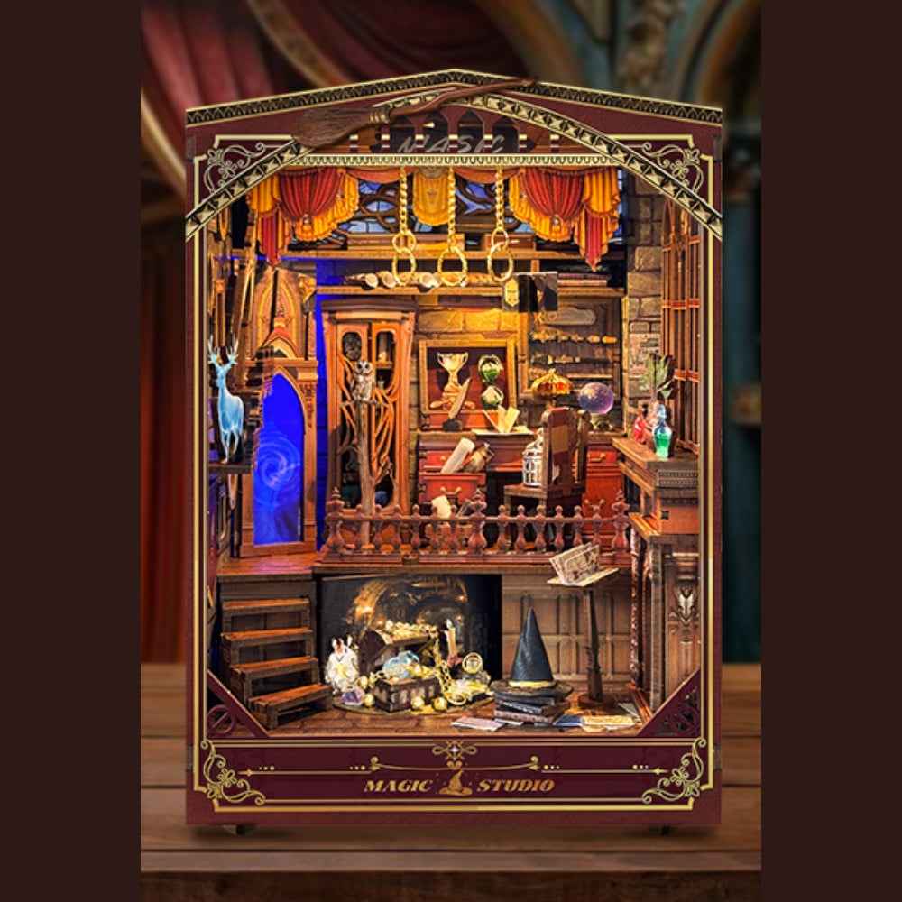 Magic Studio upgraded edition showing a miniature wizard's workroom inside a burgundy frame.