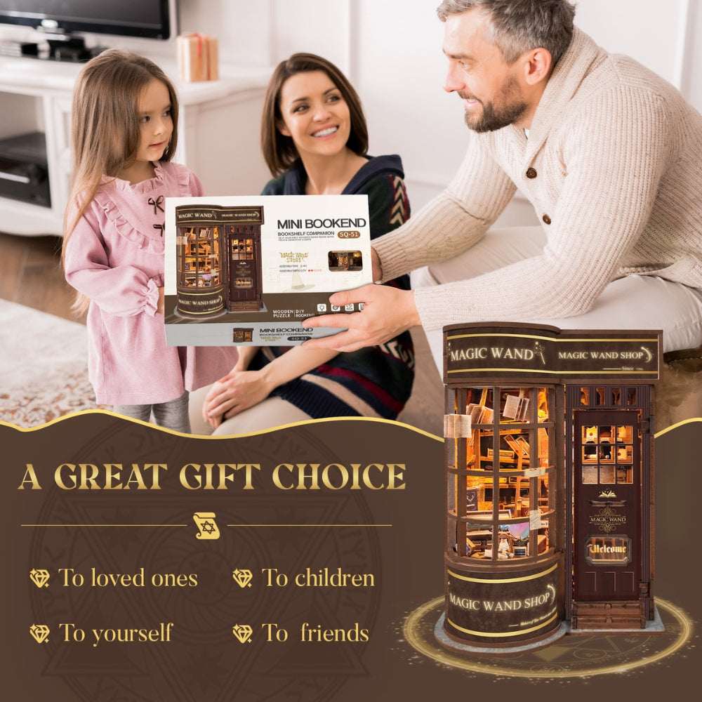 Family holding a Magic Wand Store kit box beside the assembled shop.