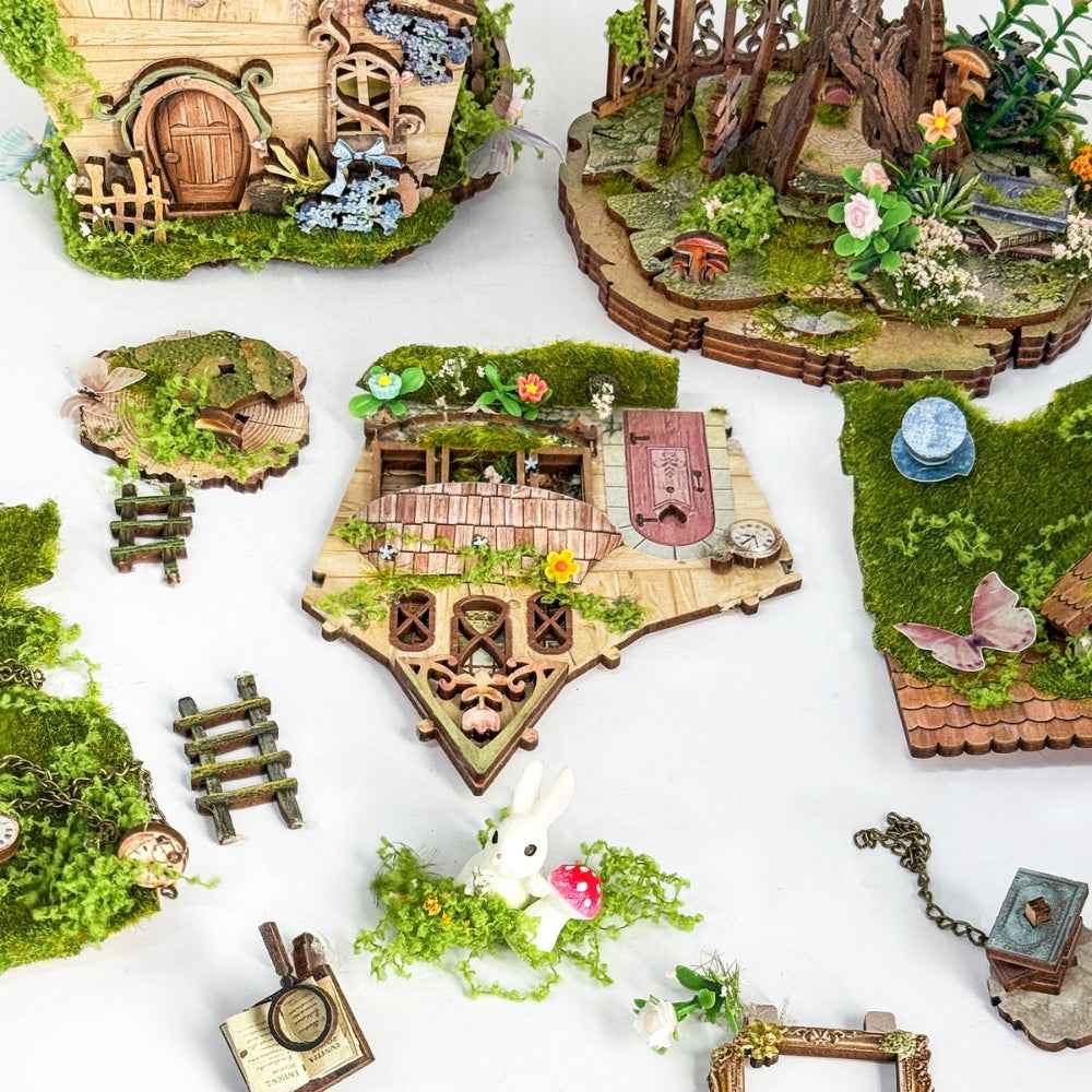 Rowan's Treehouse panels, stairs, foliage and miniature accessories laid out for assembly.