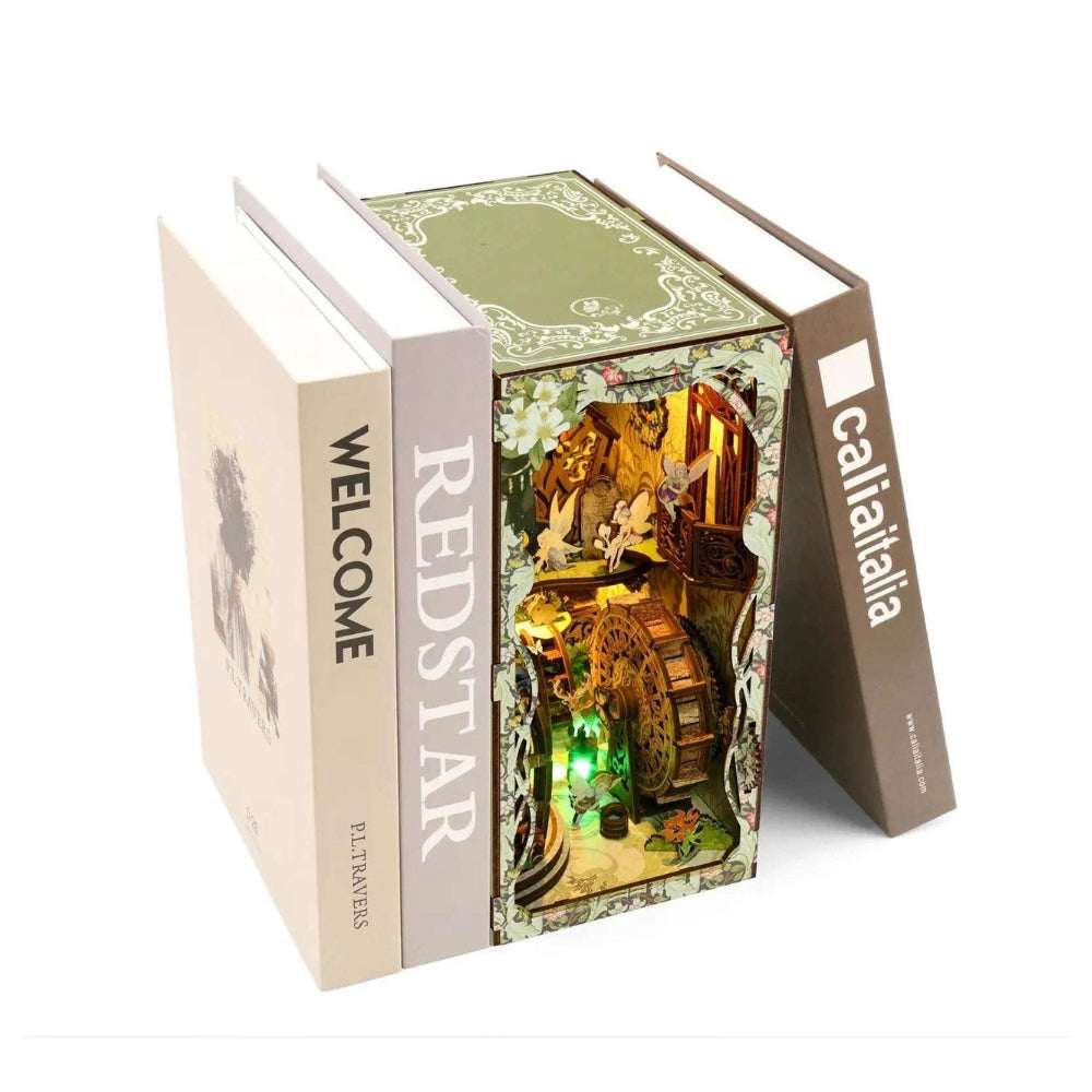 Secret World of the Forest book nook displayed between two pale books.