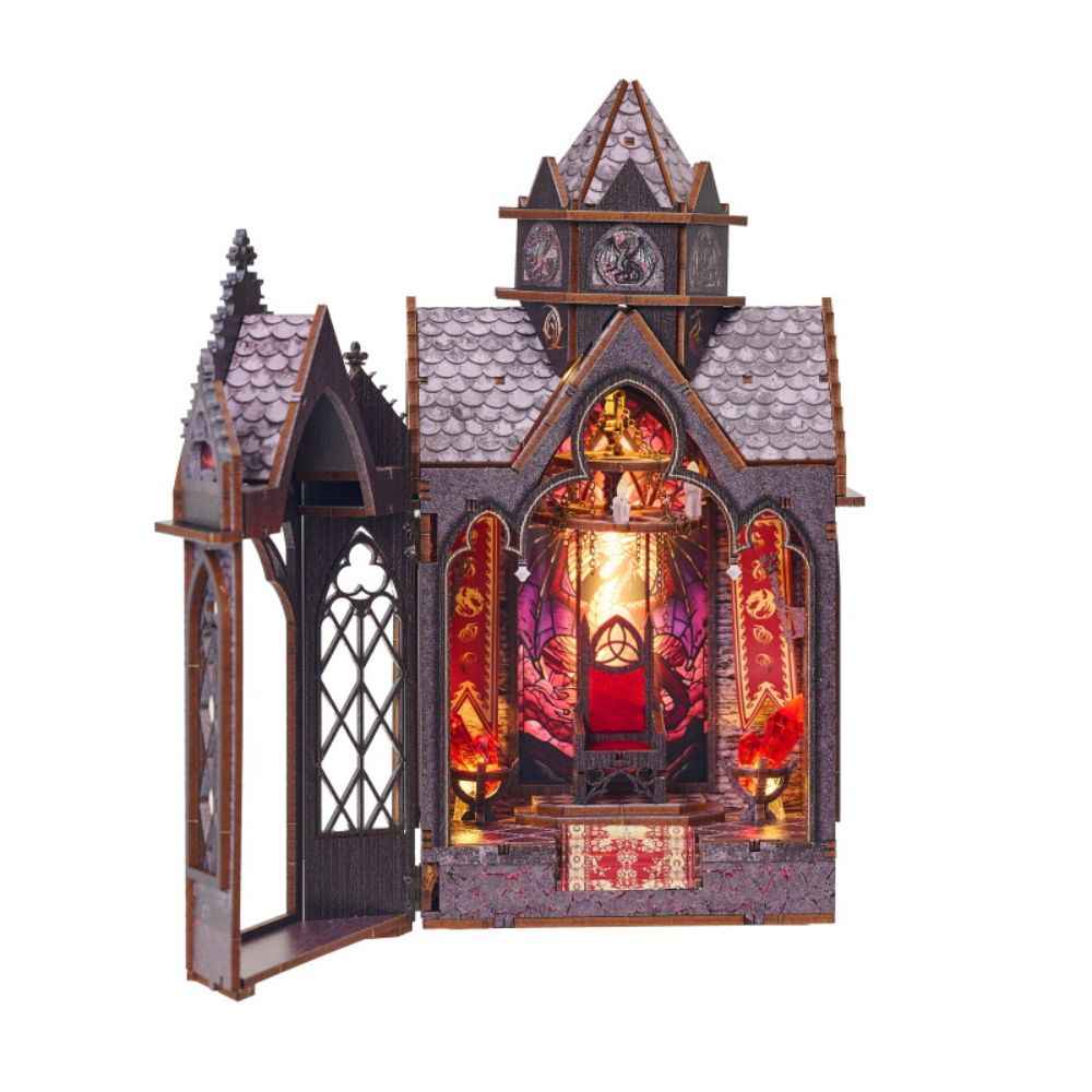 Spire of the Wyrm with its Gothic front door open to reveal a red-lit dragon interior.