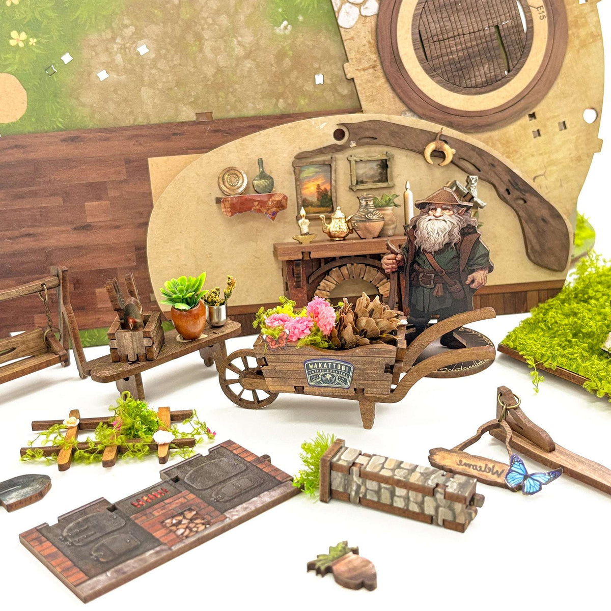 The Magic Ring House interior panels, furniture and garden pieces laid out for assembly.