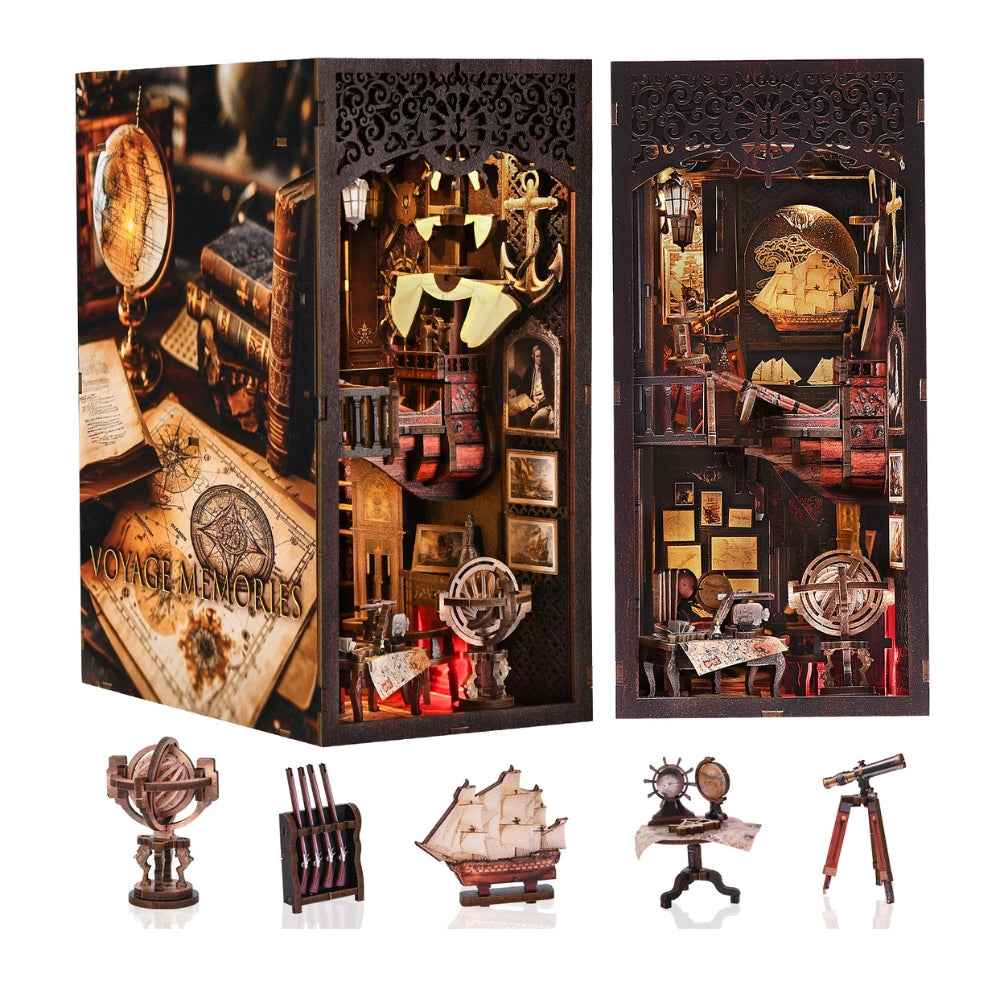 Voyage Memories book nook with nautical instruments and miniature furniture pictured below.