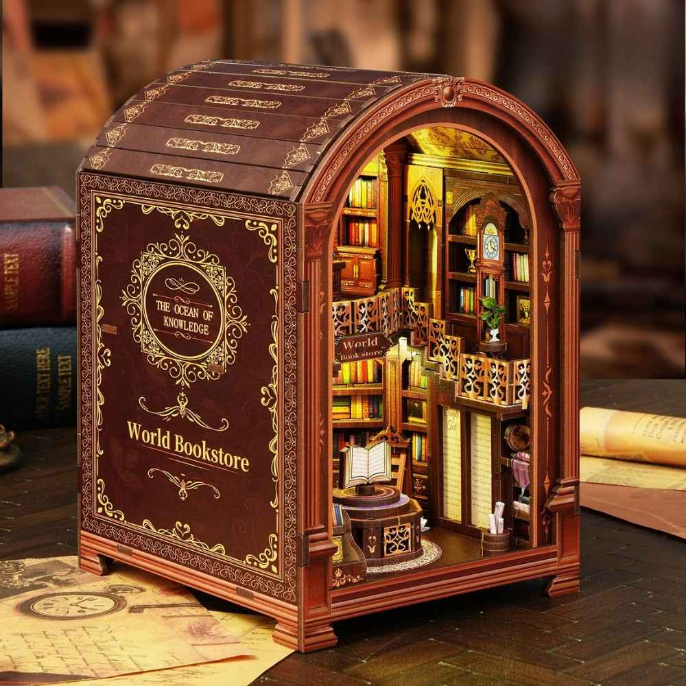 World Bookstore book nook with a rounded arch and two levels of miniature bookshelves.