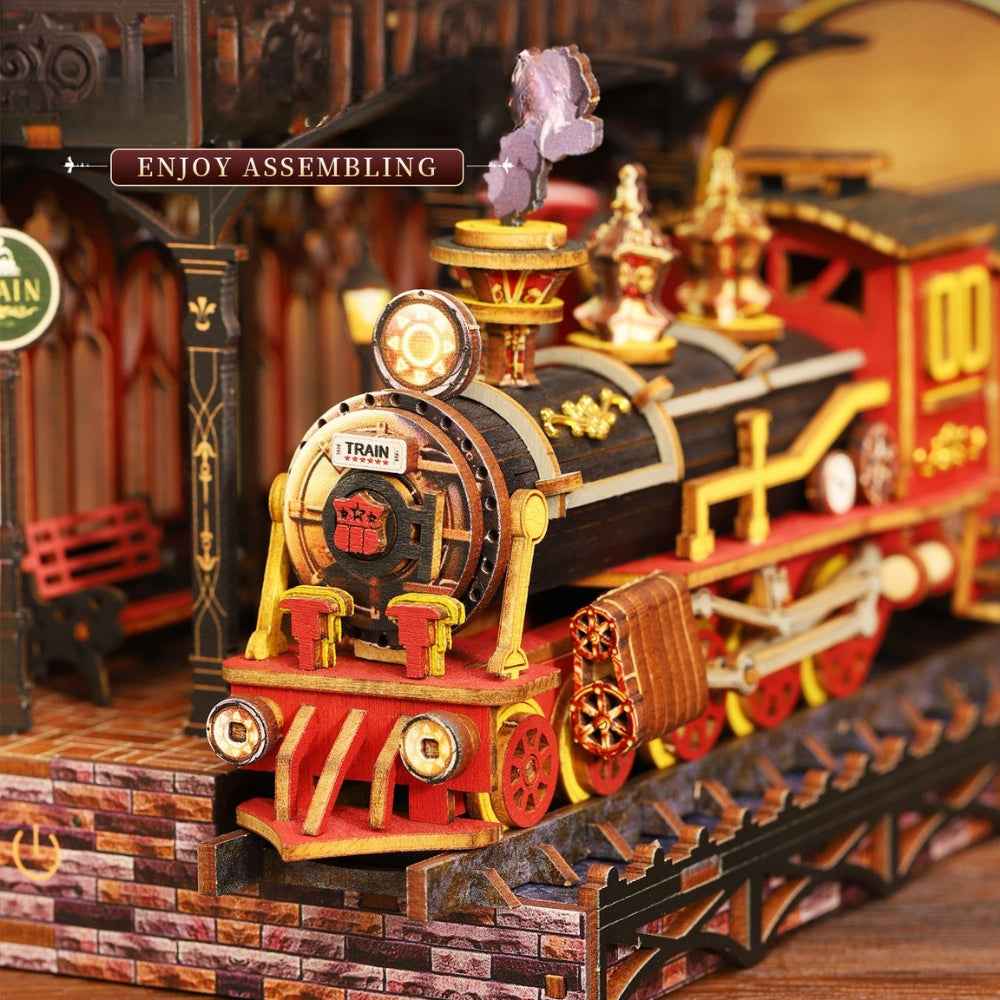 Close-up of the Zero Platform locomotive with red wheels and a tiny purple steam decoration.