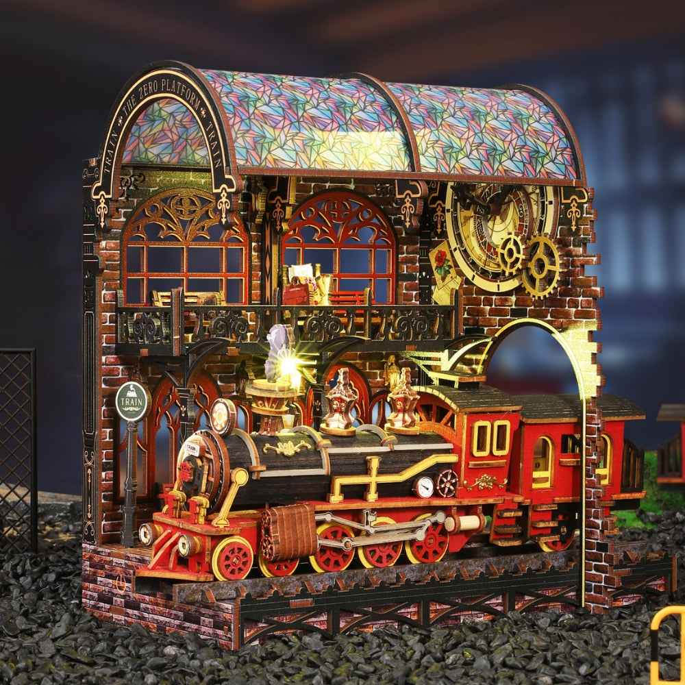 Zero Platform miniature railway scene with a red locomotive and colorful curved station roof.