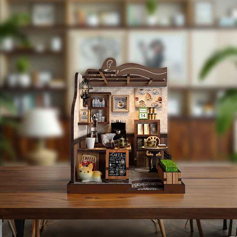 1987 Country Café miniature room displayed on a wooden table.