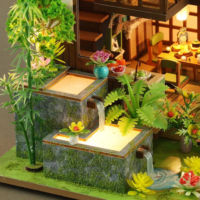 Bamboo Spring Courtyard miniature stream flowing past bamboo and small planted terraces.