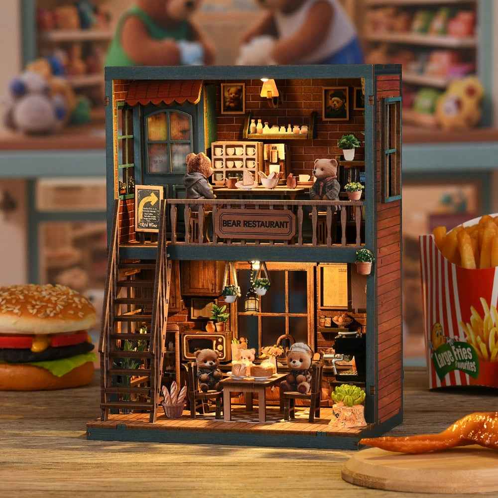 Bear Restaurant book nook with two floors of dining tables, tiny bears and a staircase.