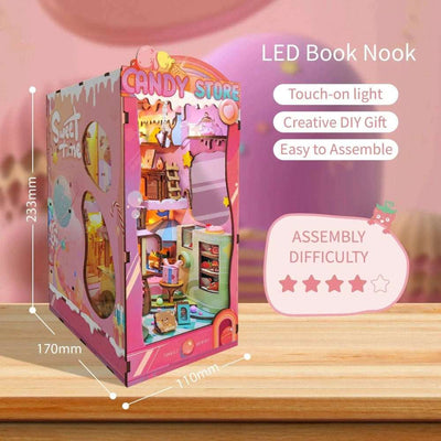 Candy Store book nook dimension diagram against a pink background.