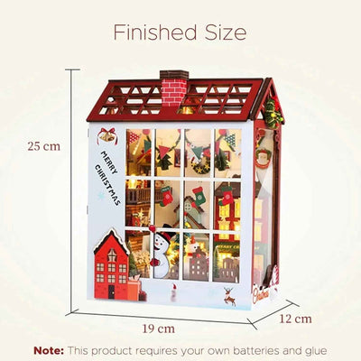 Christmas book nook dimension diagram with the completed red-and-white cabin.