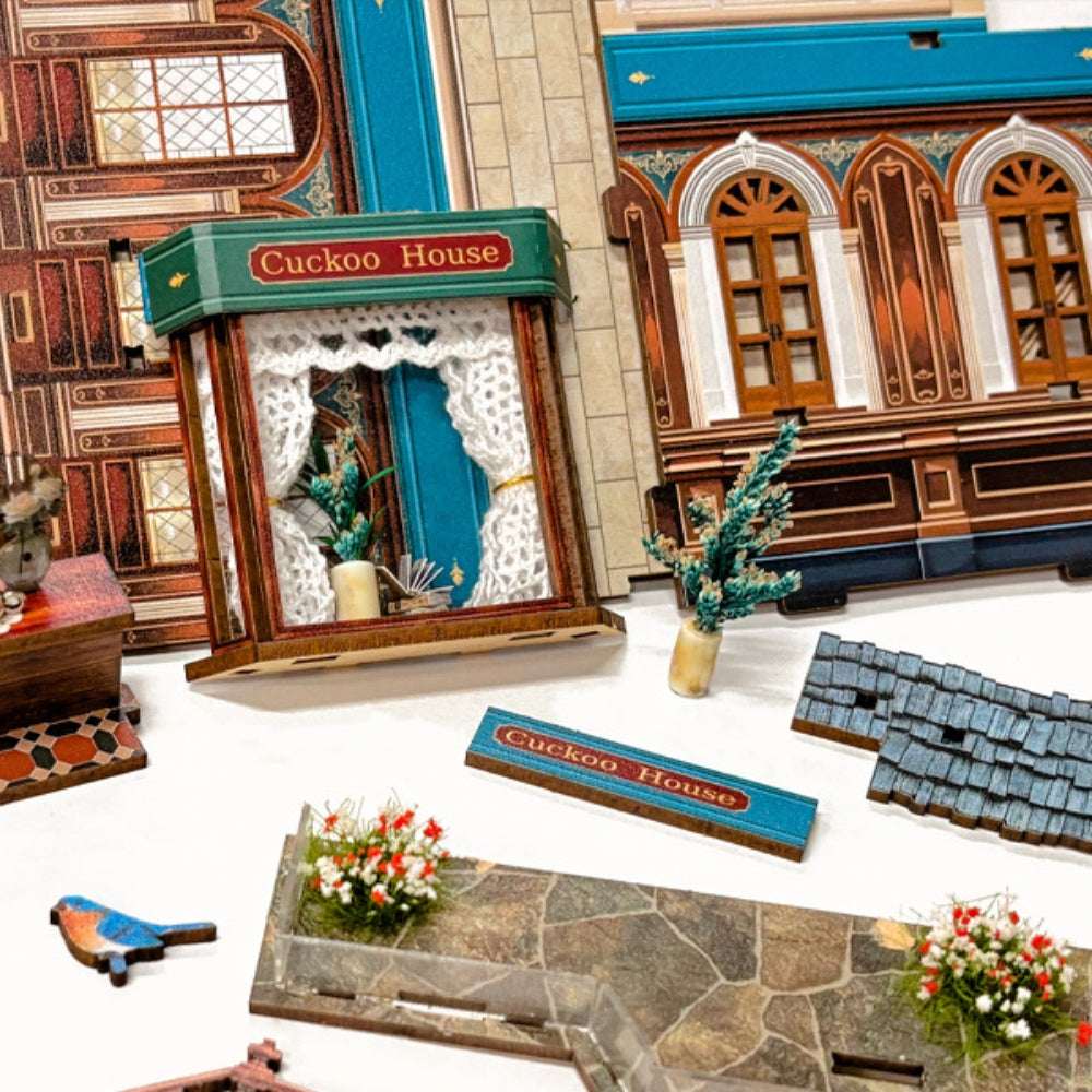 Cuckoo Clock House printed panels and small decorative parts arranged separately.