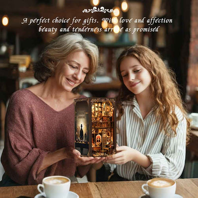 Two women holding a completed Dark Box Mystery Case book nook.