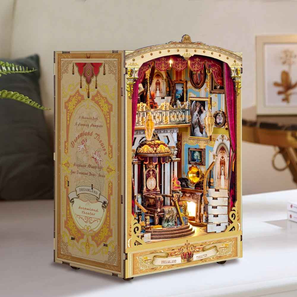 Dreamland Theater book nook with cream-and-gold trim and a miniature opera stage.