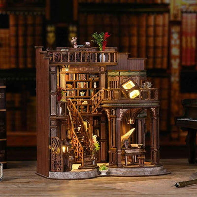 Dreamy Book Hall miniature library with tall shelves, stairs and a round projecting reading room.