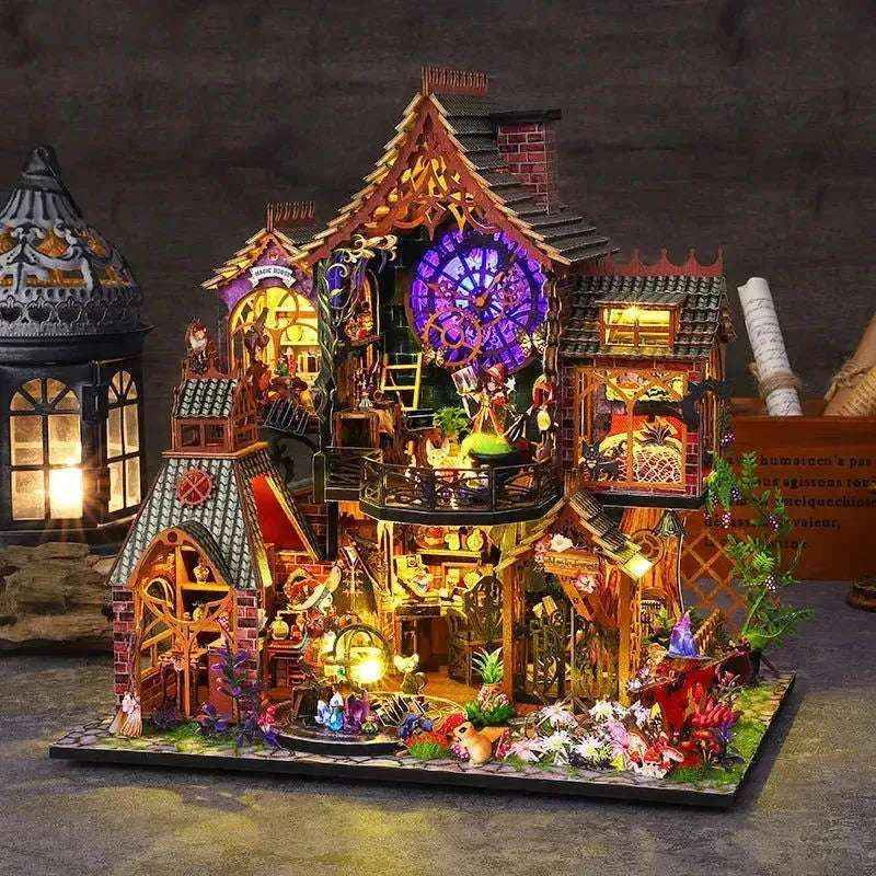 Front view of Elf House in the Forest with purple circular windows and flowers around the entrance.