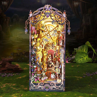 Front view of Fairytale Houses showing hanging ornaments, flowers and an illuminated miniature scene.