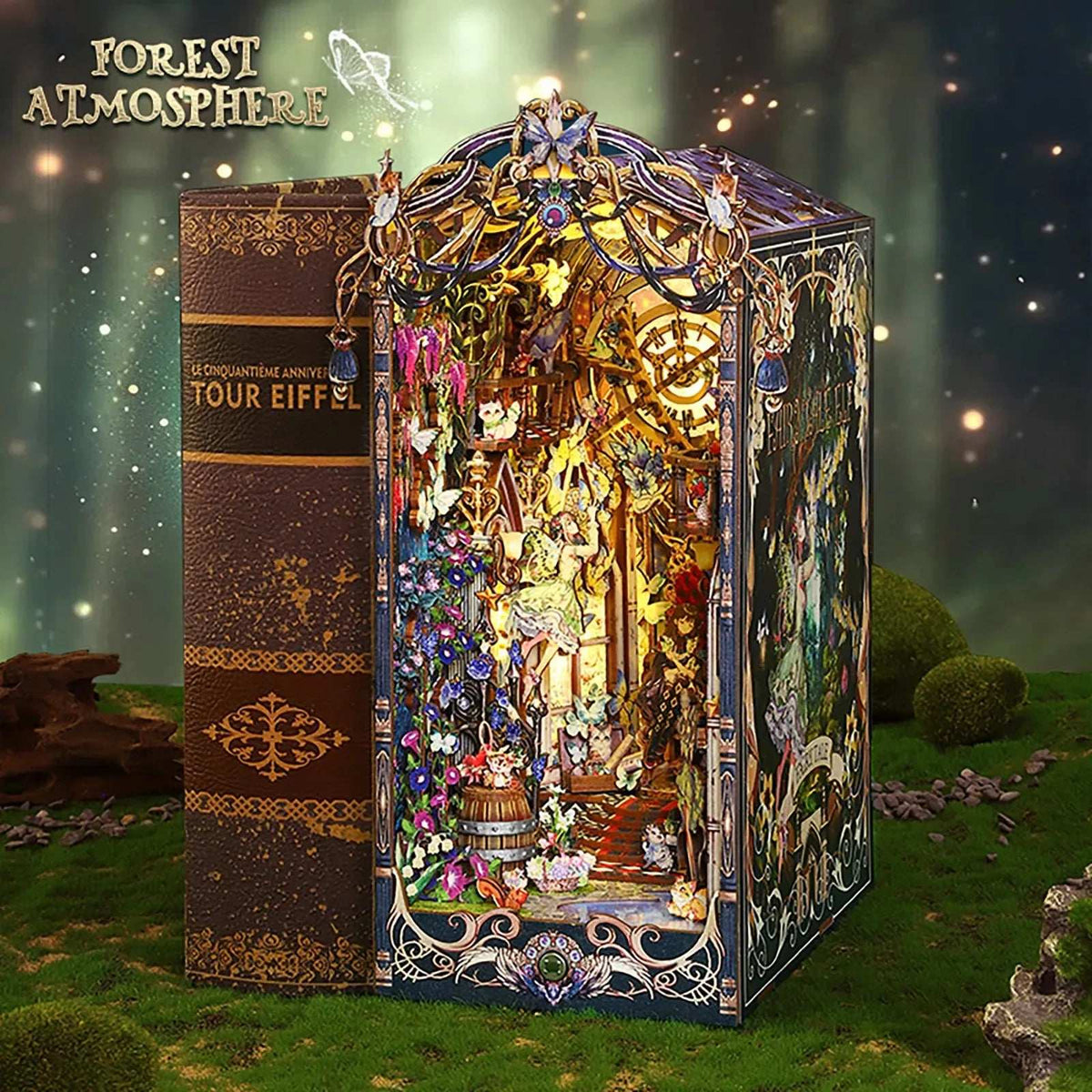 Fairytale Houses book nook beside a book, with an ornate vine-like frame and glowing forest interior.
