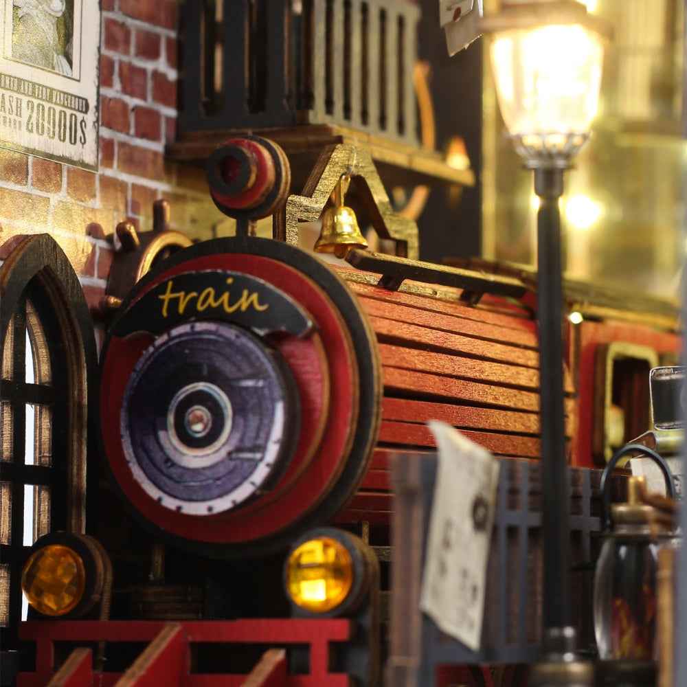 Close-up of the Fancy Train Platform locomotive front and glowing station lamp.