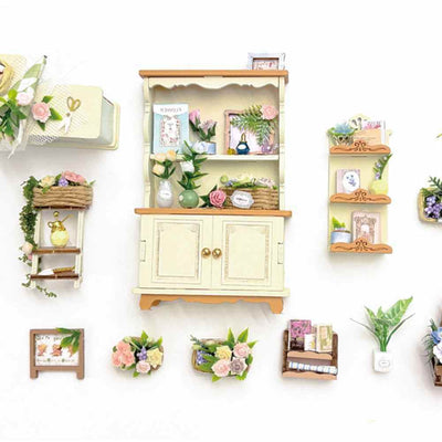 Floral Dream miniature cabinet, shelves and floral accessories laid out separately.