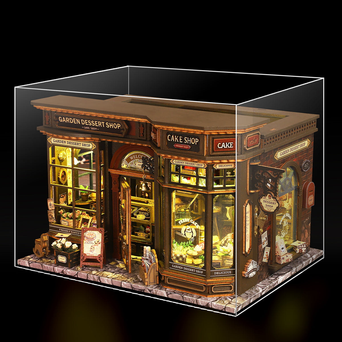Garden Dessert Shop miniature café inside a clear display case.
