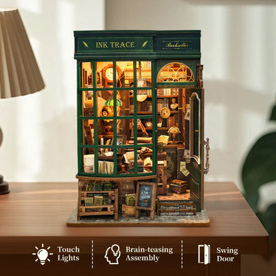 Ink Trace Bookstore displayed on a table with touch-lighting and swing-door feature icons.