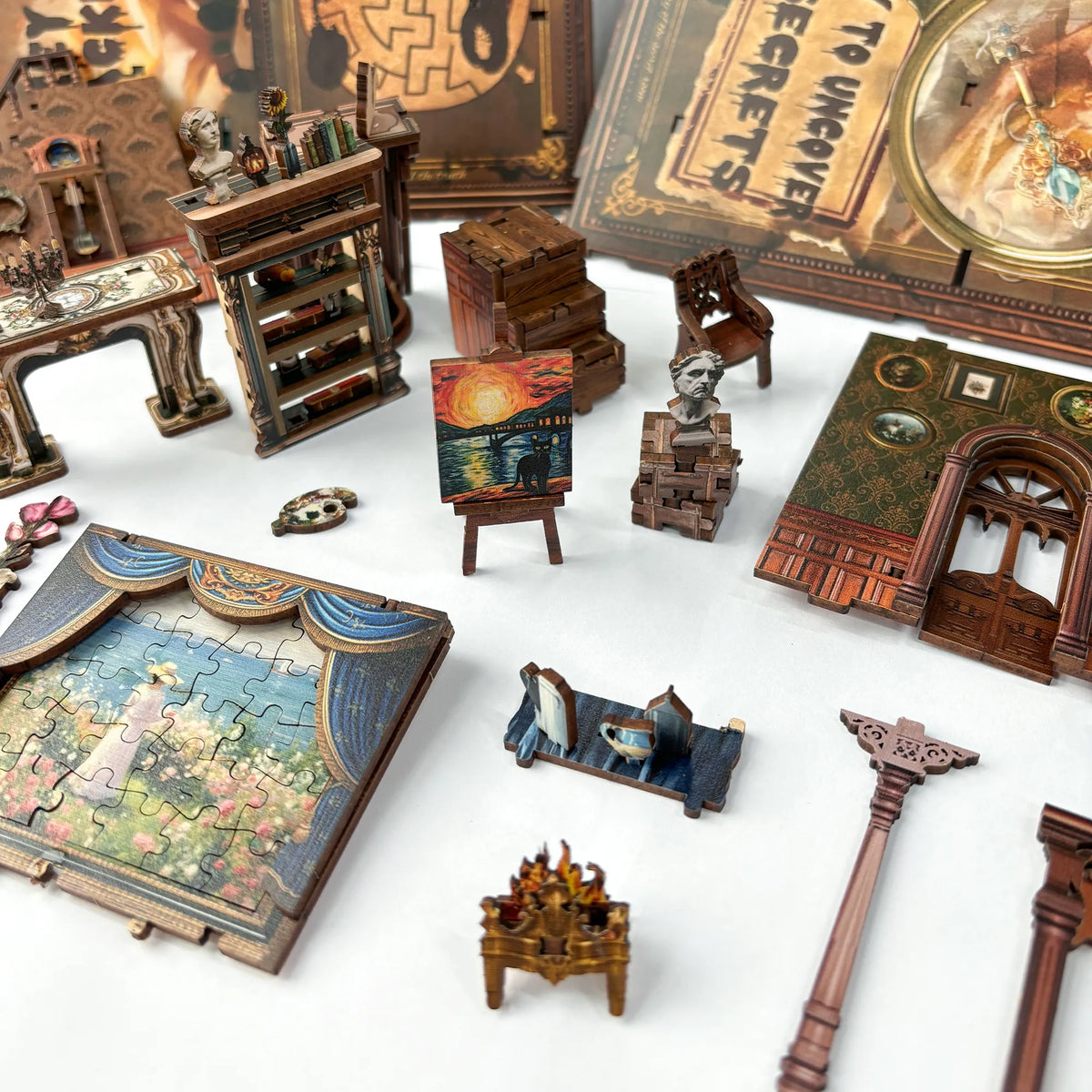 Key Tracking miniature furniture, keys and picture-puzzle pieces arranged for assembly.