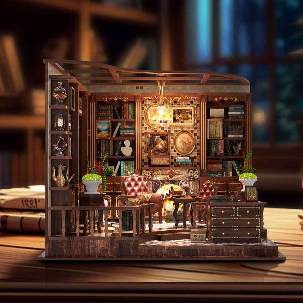 Left Bank Study miniature room with dark bookshelves, a patterned sofa and a hanging lamp.