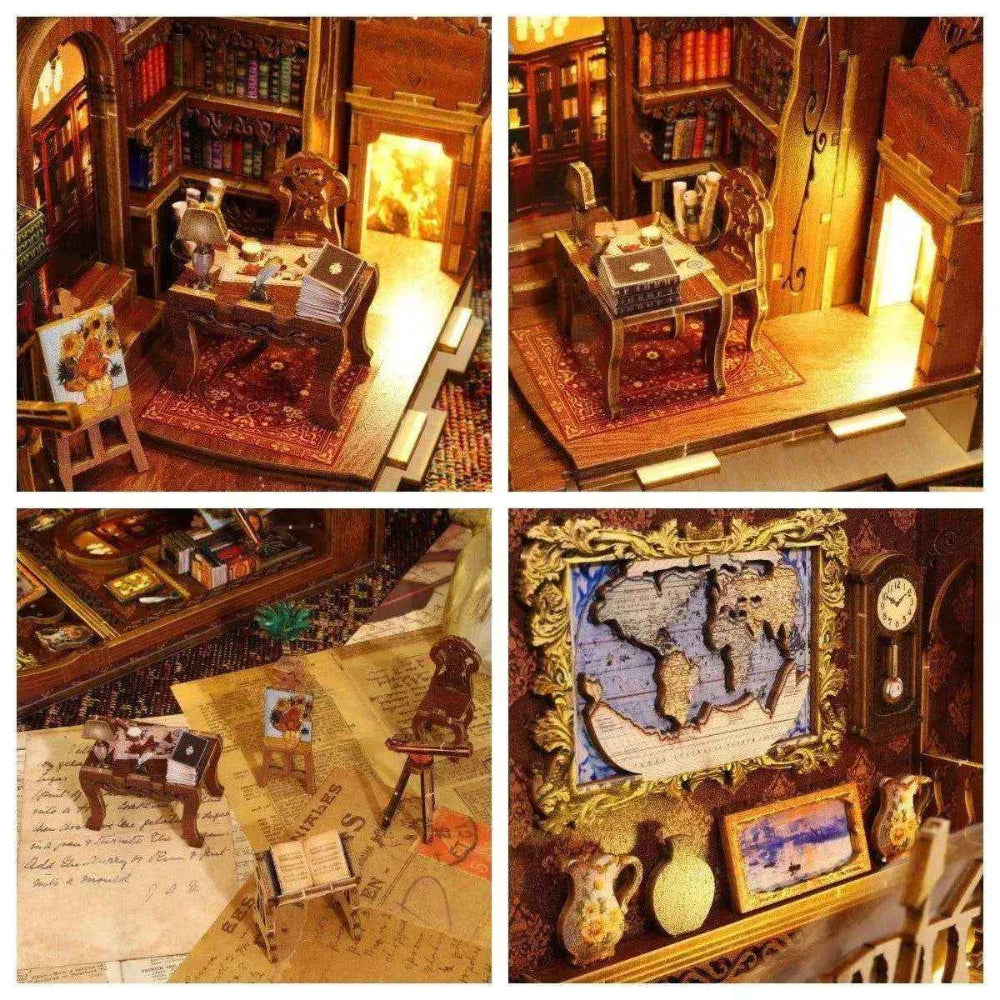 Miniature desk, maps, books and framed artwork inside the Library of Books book nook.