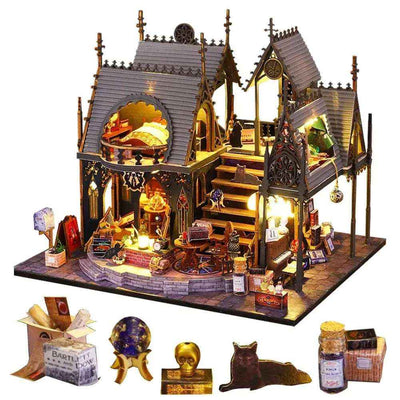 Completed Luna Magic House with miniature books, a crystal ball and other accessories arranged below.
