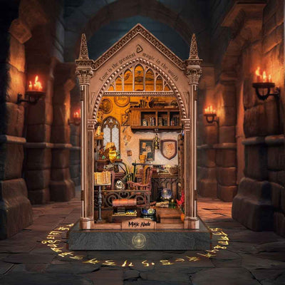 Magic Abode book nook with a pointed Gothic arch and warm-lit miniature room.