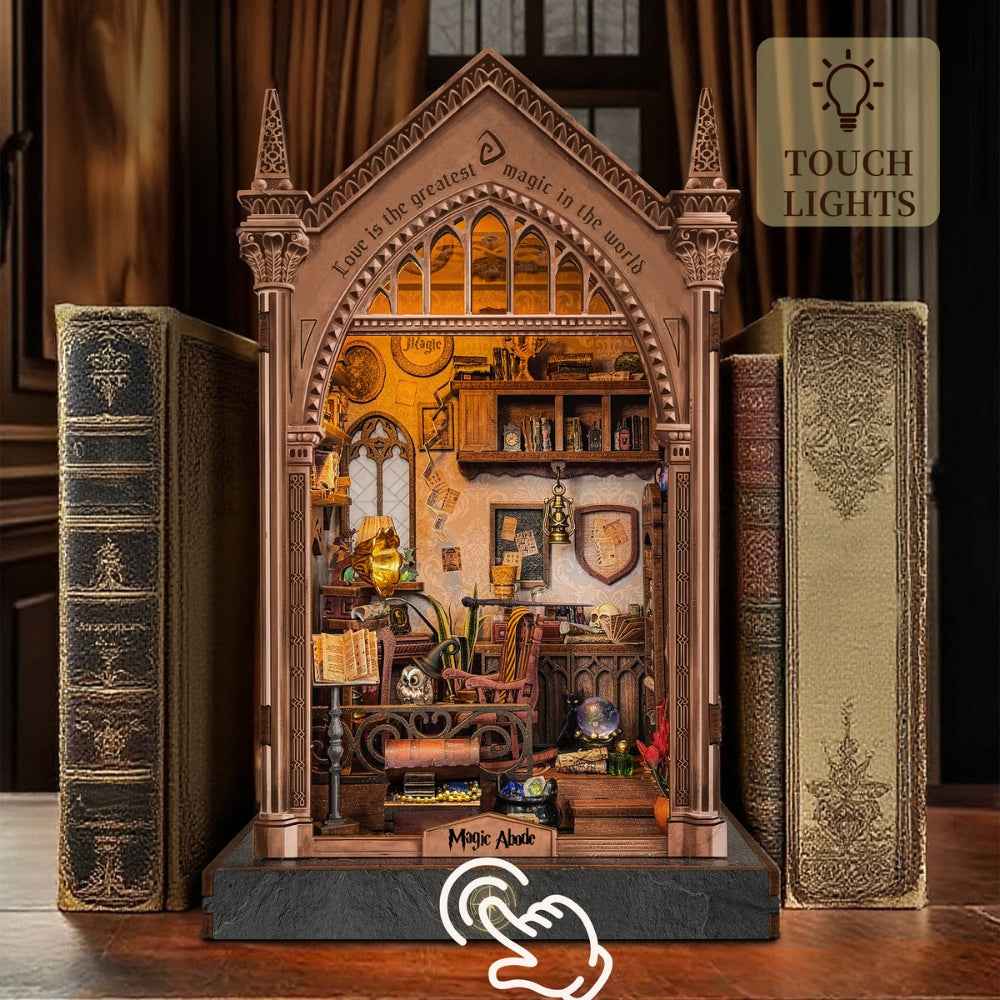 Magic Abode book nook between books with the front touch-control position marked.