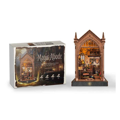 Magic Abode book nook beside its illustrated kit box.