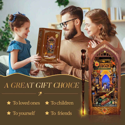Family holding a Magic Academy kit box beside the assembled book nook.