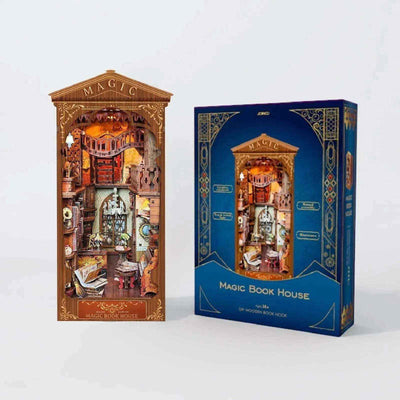 Completed Magic Book House book nook beside its blue illustrated packaging.