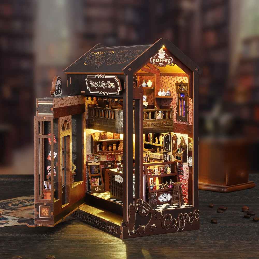 Magic Coffee House book nook with an open shop door and warm-lit café shelves.