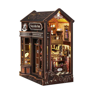 Angled Magic Coffee House book nook showing its tall café interior and dark storefront.