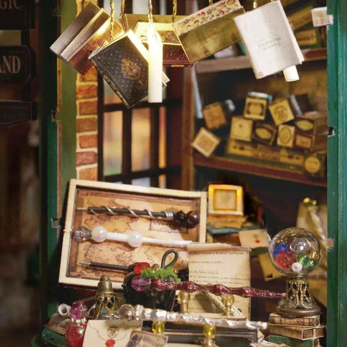 Magic House interior display with miniature wands, bottles and floating books.