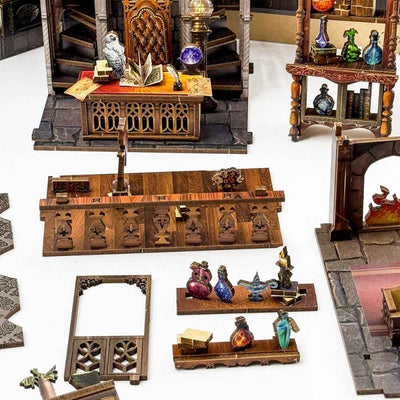 Magic Office miniature furniture, potion shelves and structural components laid out for assembly.