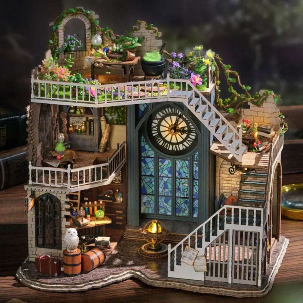 Magician's Hut miniature house with a rooftop garden, outdoor stairs and tall blue clock window.