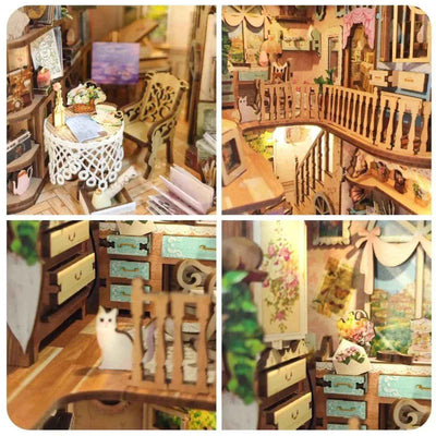Pastoral miniature cottage details, including a floral table, staircase, balcony and potted plants.